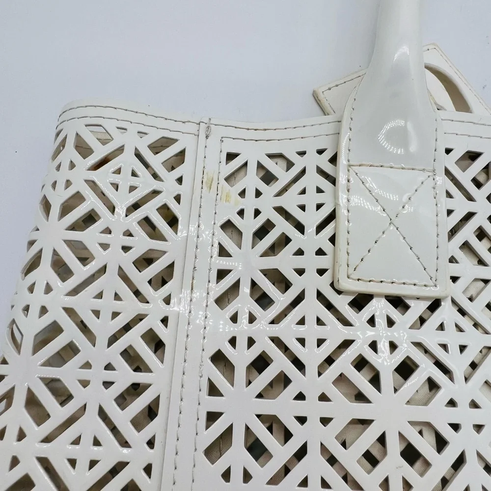 Tory Burch white geometric laser cut out tote bag